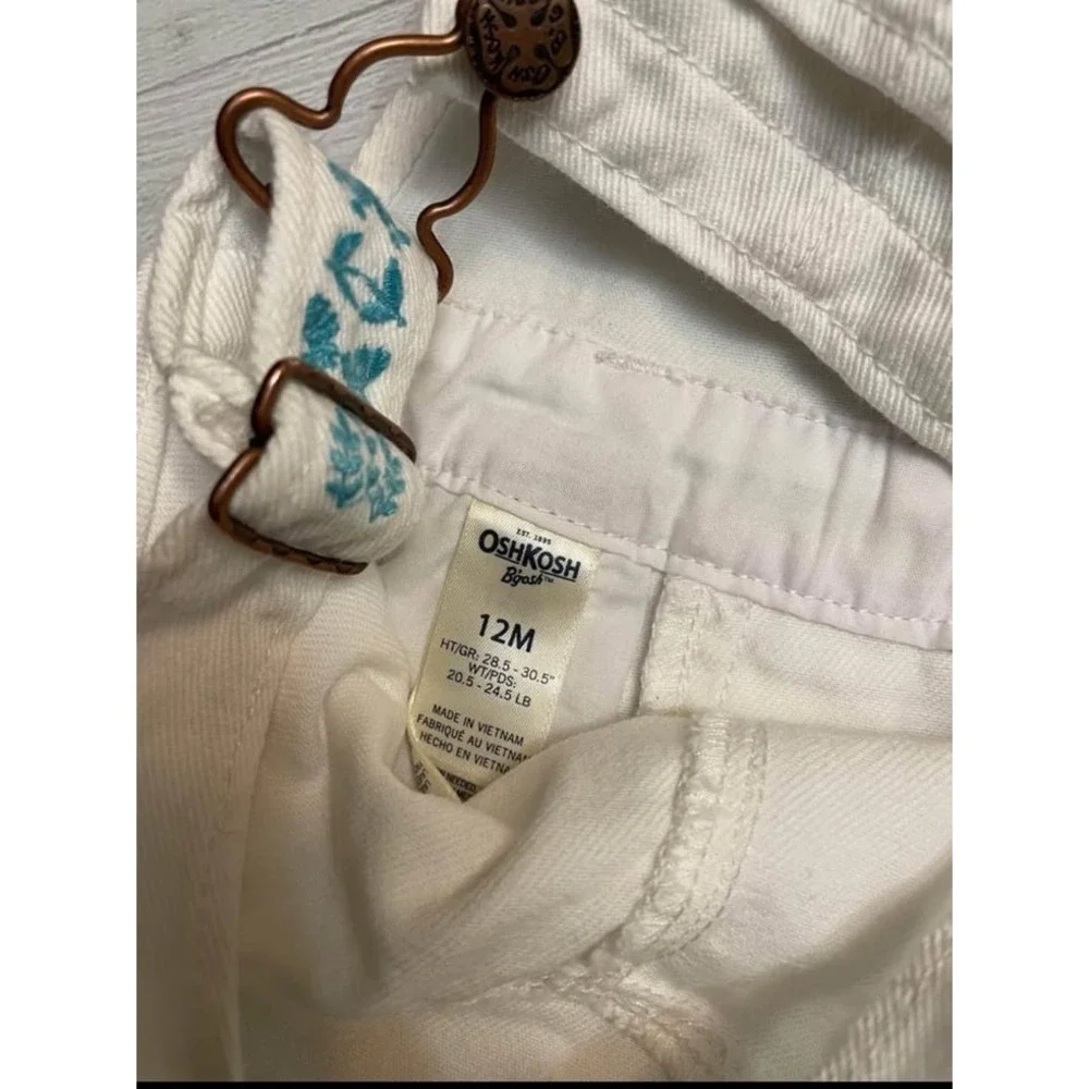OshKosh B'Gosh Baby girls white shortalls overalls with embroidered flower‎ 12m